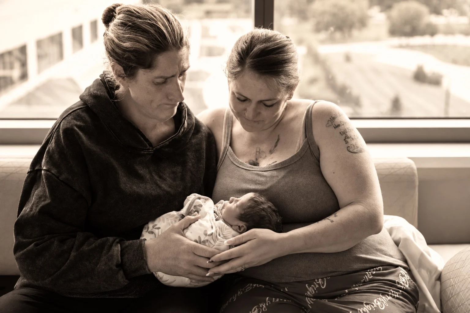 Heart to Home founders with a newborn