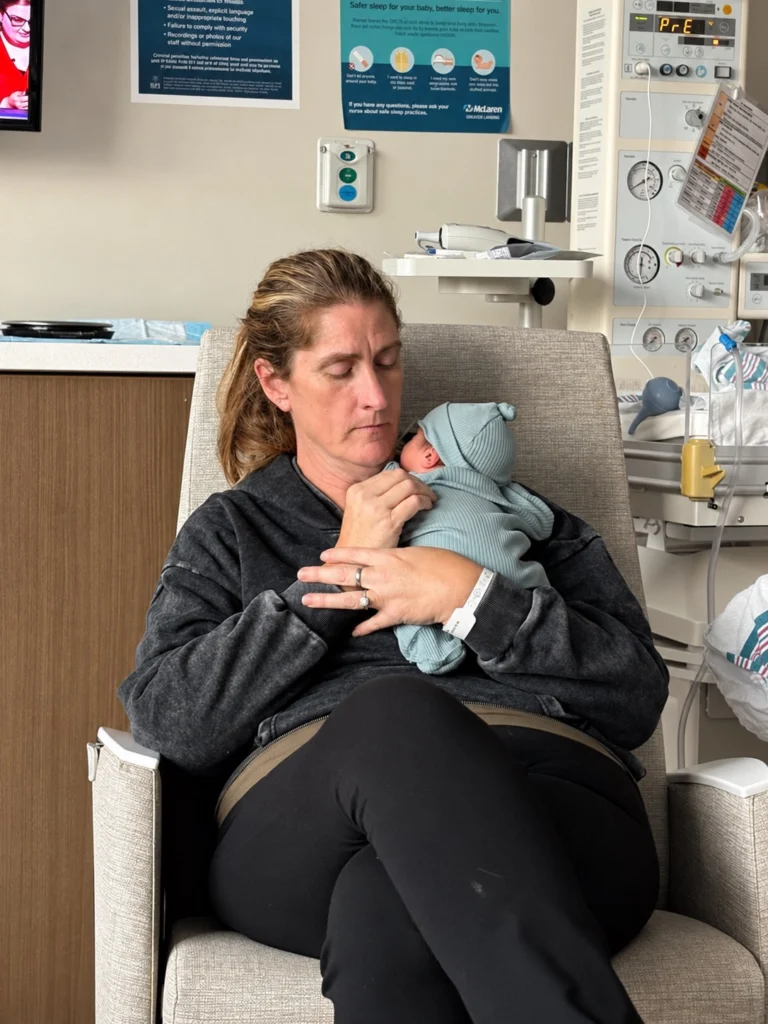 Mother holding her newborn in the hospital